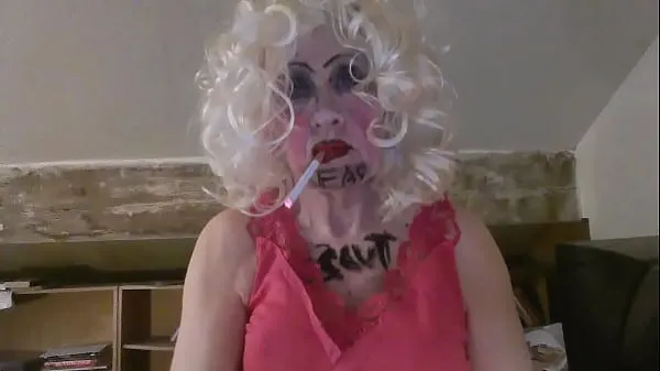 Frisse CD Sissy Sarah Millward knows her ID, as indicated by what's written on her face and chest - 'fag slut' - as she smokes, wanks her clit, and stuffs a dildo up her nasty lady hole nieuwe films