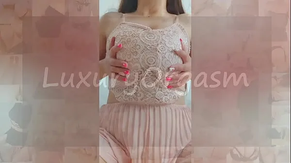 Fresh Pretty girl in pink dress and brown hair plays with her big tits . Amateur video new Movies